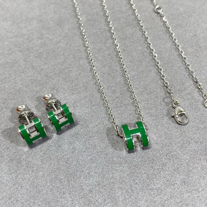{
  "Resenly Jewelry": "Resenly Jewelry",
  "POP H GREEN NECKLACE SILVER AND GOLD": "POP H グリーンネックレス シルバー＆ゴールド"
}
