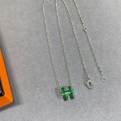 {
  "Resenly Jewelry": "Resenly Jewelry",
  "POP H GREEN NECKLACE SILVER AND GOLD": "POP H グリーンネックレス シルバー＆ゴールド"
}