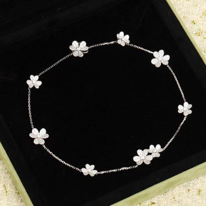{
  "Resenly Jewelry": "Resenly Jewelry",
  "FRIVOLE SILVER 9 FLOWERS NECKLACE": "フリヴォル シルバー 9フラワー ネックレス"
}