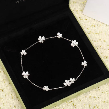 {
  "Resenly Jewelry": "Resenly Jewelry",
  "FRIVOLE SILVER 9 FLOWERS NECKLACE": "フリヴォル シルバー 9フラワー ネックレス"
}