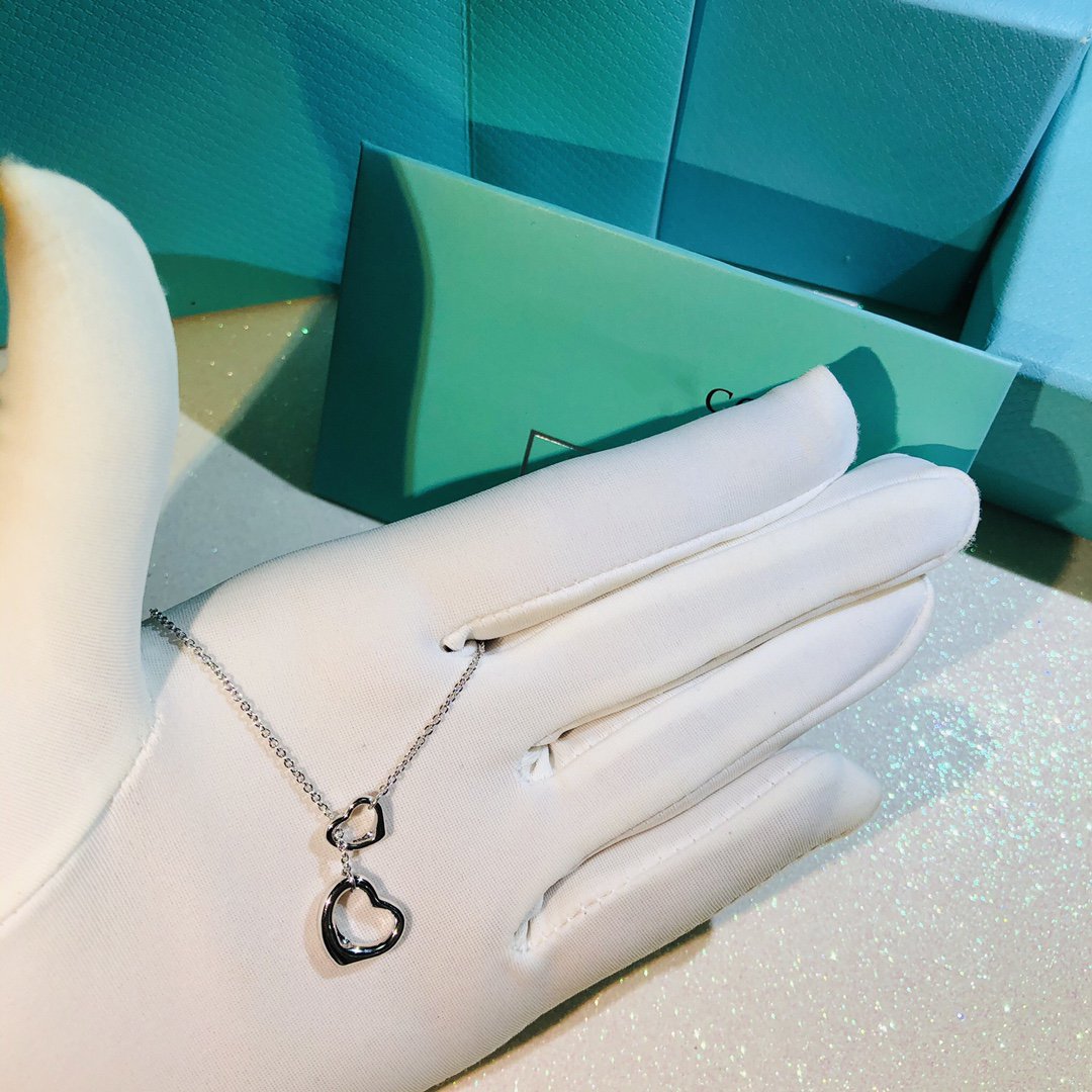 {
  "Resenly Jewelry": "Resenly Jewelry",
  "OPEN HEART LARIAT NECKLACE SILVER": "オープンハート ラリアット ネックレス シルバー"
}