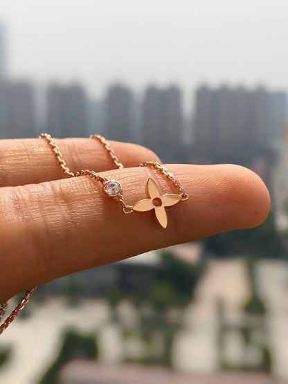 {
"Resenly Jewelry": "リゼンリー・ジュエリー",
"BLOSSOM PENDANT PINK GOLD AND DIAMOND": "ブロッサム ペンダント ピンクゴールド＆ダイヤモンド"
}
