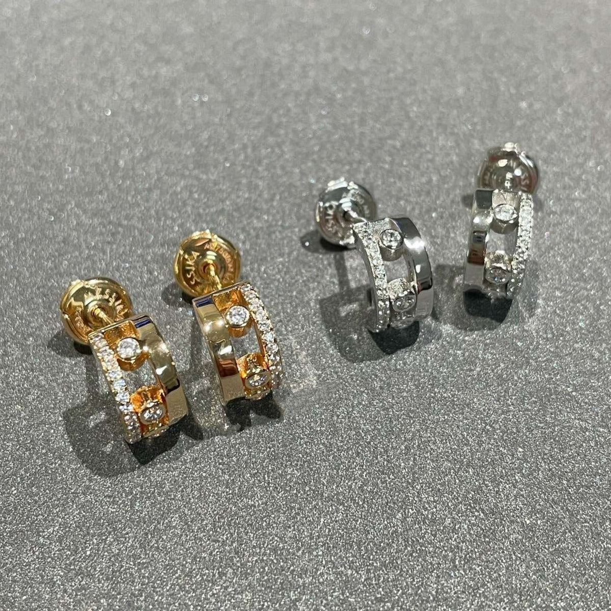 {
  "Resenly Jewelry": "レゼンリー・ジュエリー",
  "MOVE ROMANE EARRINGS DIAMOND": "ムーヴ ロマーヌ イヤリング ダイヤモンド"
}
