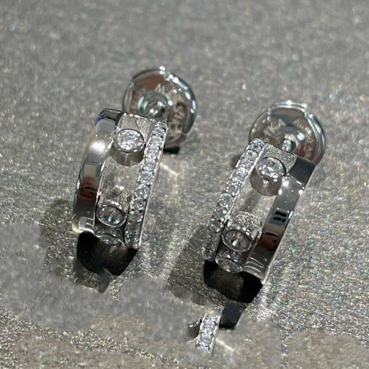 {
  "Resenly Jewelry": "レゼンリー・ジュエリー",
  "MOVE ROMANE EARRINGS DIAMOND": "ムーヴ ロマーヌ イヤリング ダイヤモンド"
}