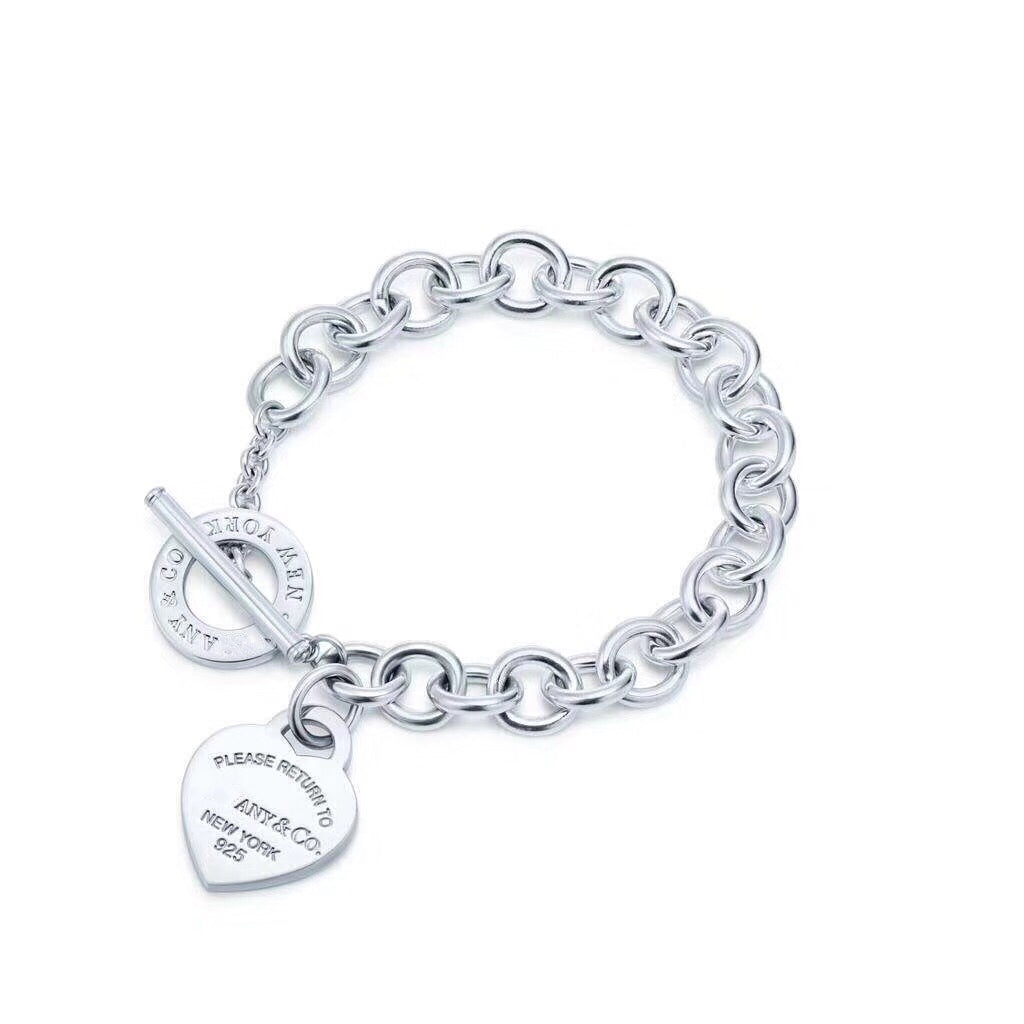 {
"Resenly Jewelry": "Resenly Jewelry",
"LOVE HEART PIN BUCKLE RETURN TO TIF SILVER BRACELET": "リターントゥティファニー ラブハート ピンバックル シルバーブレスレット"
}