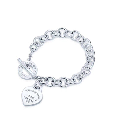 {
"Resenly Jewelry": "Resenly Jewelry",
"LOVE HEART PIN BUCKLE RETURN TO TIF SILVER BRACELET": "リターントゥティファニー ラブハート ピンバックル シルバーブレスレット"
}