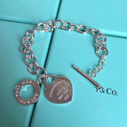 {
"Resenly Jewelry": "Resenly Jewelry",
"LOVE HEART PIN BUCKLE RETURN TO TIF SILVER BRACELET": "リターントゥティファニー ラブハート ピンバックル シルバーブレスレット"
}