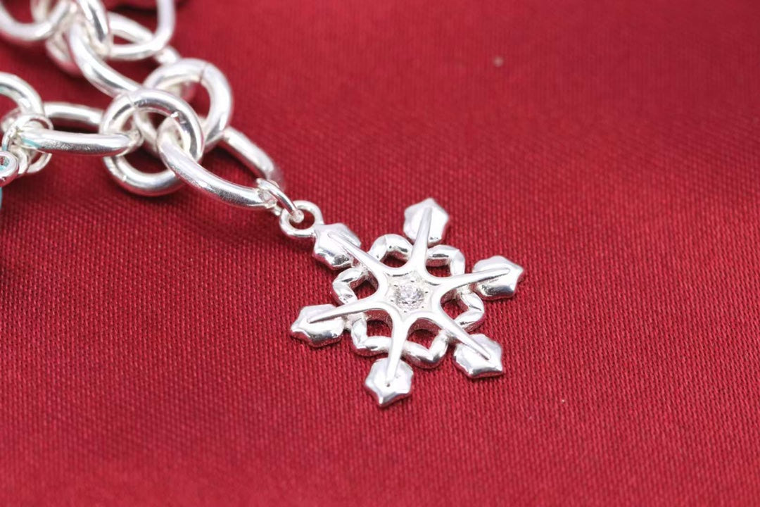 {
  "Resenly Jewelry": "Resenly Jewelry",
  "CHRISTMAS SILVER BRACELET": "クリスマス・シルバーブレスレット"
}