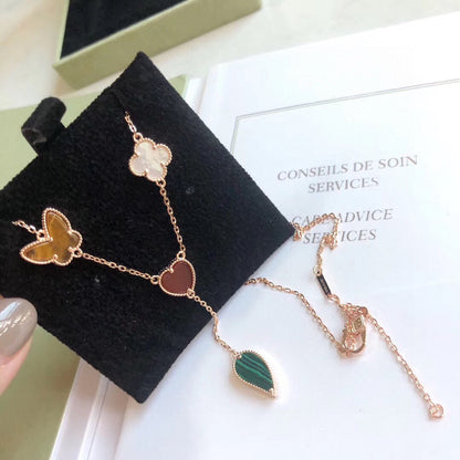 {
  "Resenly Jewelry": "Resenly Jewelry",
  "LUCKY SPRING 4 MOTIFS ROSE GOLD NECKLACE": "LUCKY SPRING 4モチーフ ローズゴールド ネックレス"
}
